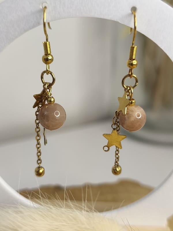 Boucles d'oreilles et pierre de soleil